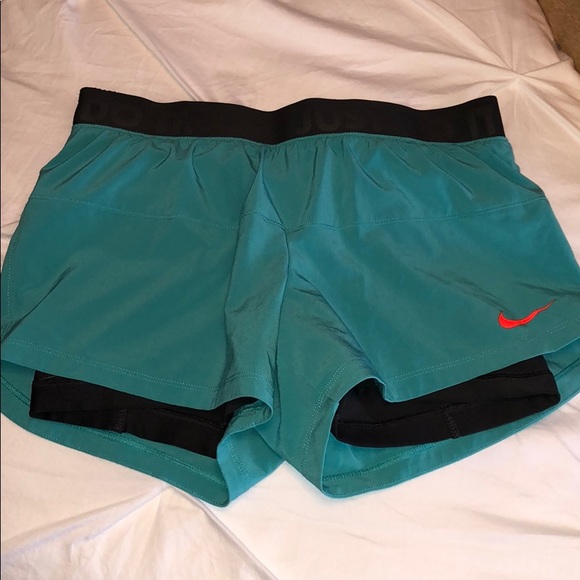 Nike Pants - Nike shorts with spandex inside